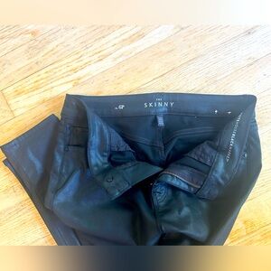 White House Black Market “the skinny” black shimmer jeans.